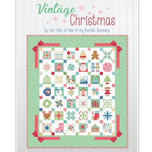 May include: A quilt pattern titled Vintage Christmas by Lori Holt of Bee in my Bonnet Company. The quilt features a grid of squares with various holiday motifs including a gingerbread man, Santa, train, tree, stocking, and candy canes in red, green, and white.