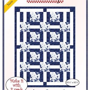 May include: A Fabric Cafe quilt pattern titled "Porch Rails." The quilt design features a repeating pattern of blue and white squares and rectangles. The pattern requires 3 yards of fabric and measures 45.5 inches by 60.5 inches.