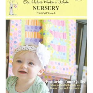May include: A baby smiles in front of a crib, wearing a white headband with a flower and a green top. The background features a colorful quilt with pink, blue, and green patches. Text reads "Six Halves Make a Whole NURSERY".