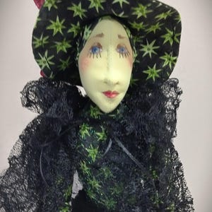 OOAK Cloth Art Doll, Standing Green Witch in Black/Green with Maroon Ribbon trim.