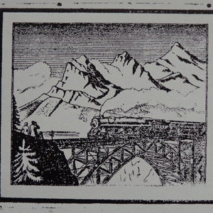 May include: Black and white illustration of a train crossing a bridge in front of a mountain range. The train is made up of several cars and is traveling towards the viewer. The mountains are in the background and are covered in snow.