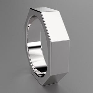 May include: A silver octagonal ring with a smooth, polished finish.