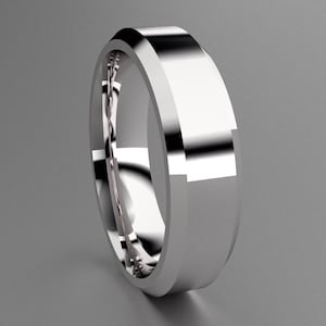 May include: A silver wedding band with a beveled edge and a polished finish.