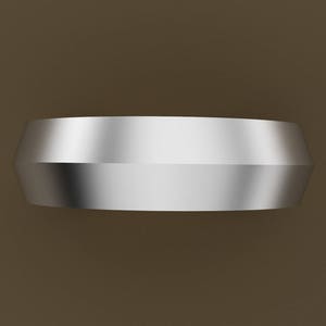 Peut inclure: Une bague en m&eacute;tal argent&eacute; avec un dessus arrondi l&eacute;g&egrave;rement bomb&eacute; et une finition lisse et polie.