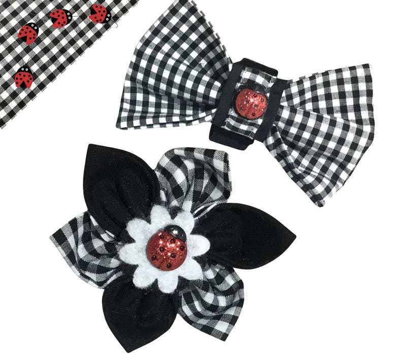 May include: Two black and white gingham fabric hair bows with red ladybug embellishments. One bow is a simple bow, the other is a flower shape.