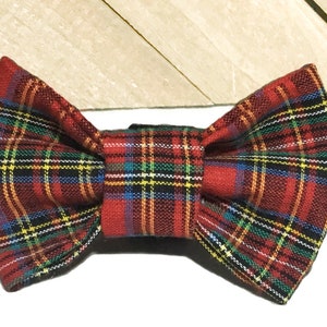May include: Red, blue, yellow, and black plaid bow tie.