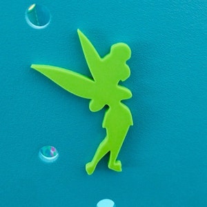 May include: A green silhouette of Tinkerbell, a fairy with wings, on a blue background.