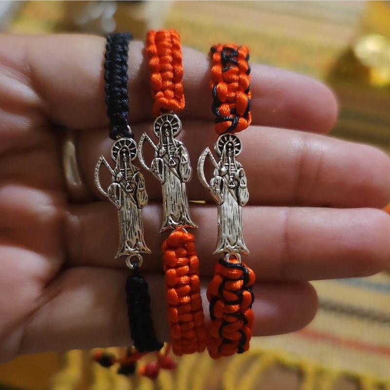 Black Santa Muerte bracelet- wood background main image 0