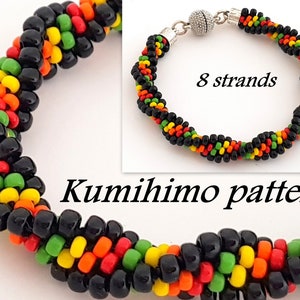 May include: A black, green, yellow, and orange beaded bracelet with a silver clasp. The bracelet is made using a kumihimo pattern with 8 strands. The text "Kumihimo pattern" is visible below the bracelet.