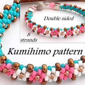 May include: Double-sided bracelet made with 8 strands of beads in turquoise, pink, white, and brown colors. The bracelet is made using a kumihimo pattern.