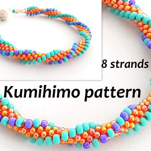 May include: A close-up of a turquoise, orange, and purple beaded bracelet made with the kumihimo technique. The bracelet is made with 8 strands of beads and has a silver clasp. The text "Kumihimo pattern" is visible in the image.