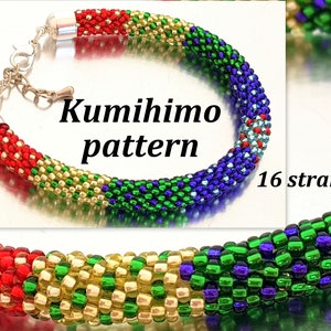 Op de afbeelding: Een Kumihimo patroon armband met 16 strengen. De armband heeft een kleurovergang van rood, goud, groen en blauw. De tekst "Kumihimo pattern" en "16 strengen" zijn zichtbaar.