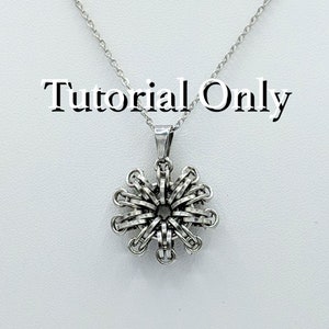May include: A silver chain necklace with a silver pendant in the shape of a flower. The pendant is made of many small, interconnected rings. The text "Tutorial Only" is visible in the image.