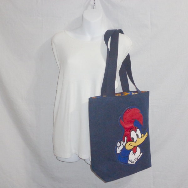 Tote/Purse shoulder straps  inside pockets. Large tote stylish and goes well with a variety of outfits many design in totes.