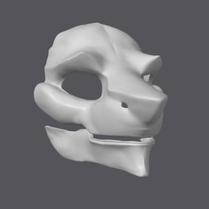 Può includere: Una maschera bianco sporco renderizzata in 3D con un design stilizzato a teschio di animale. La maschera presenta grandi orbite, un muso prominente e una mascella dettagliata. Il design generale suggerisce un tema fantasy o cosplay.
