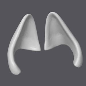 May include: A pair of white, sculpted, pointed ears. The ears are curved and have a smooth, rounded surface.