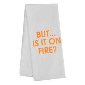 Mais... Est-ce qu'il est en feu ? - Un torchon