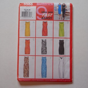 May include: A Butterick sewing pattern envelope, featuring nine dress designs. The cover displays dress illustrations in various colors and patterns, including yellow, red, black, and blue. Text includes "nine sew FAST & EASY" and pattern number 5588.