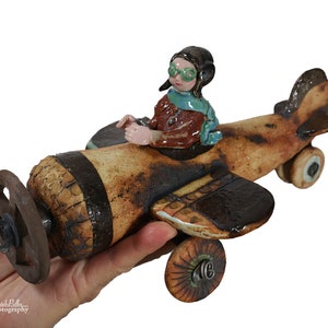 Aviator, hide - lonely on the way - an intimate ceramic sculpture from the &quot;Parallel World&quot; collection  by Cela37