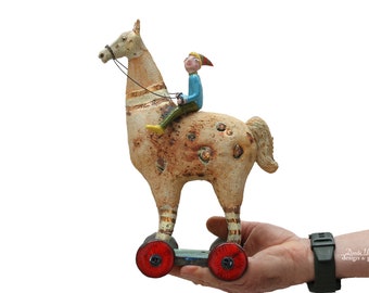 Horse with red wheels - On the roads of the world - standing ceramic sculpture