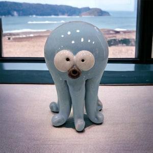 Sculpture in the shape of a Celestial Octopus in ceramic/Marine ornament house by the sea