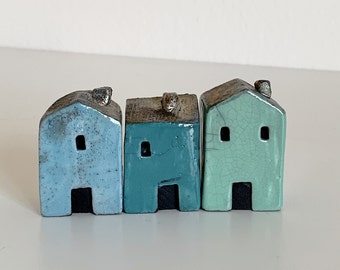 Colorful ceramic village miniature houses set