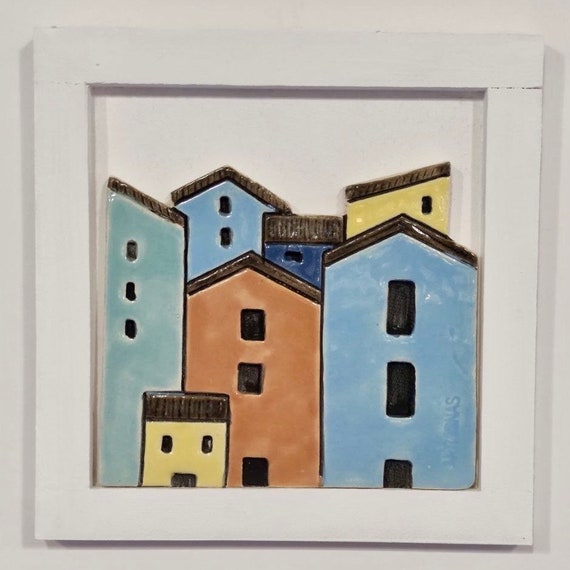 Painting landscape houses in ceramic artijanas