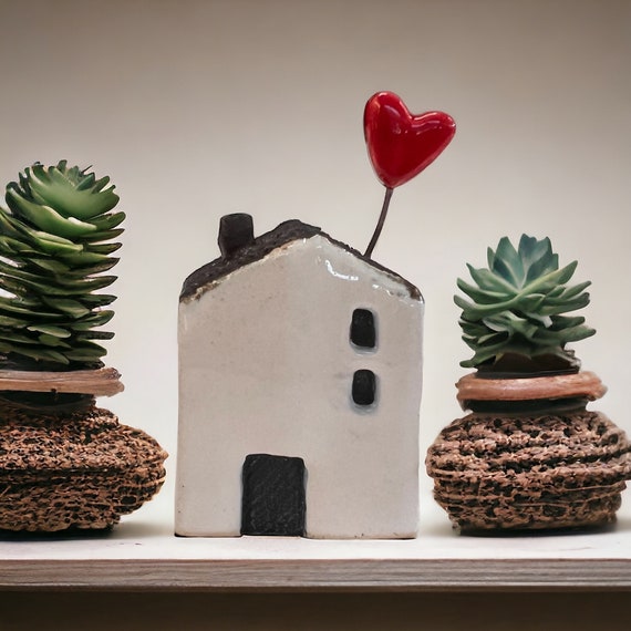 Miniature ceramic house with a red heart on the roof. New ceramic house gift/love house/village garden ornament.