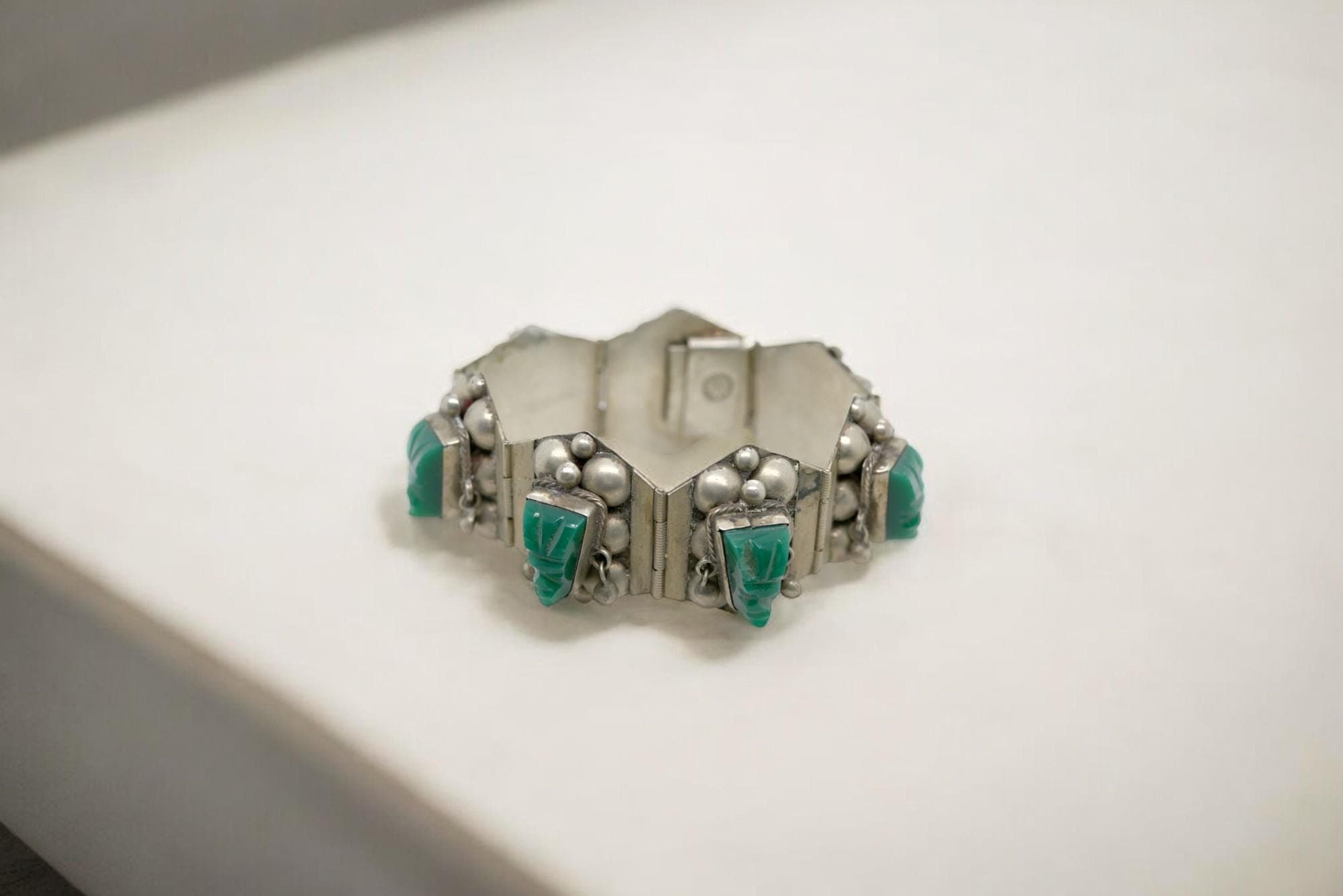 Sterling Silver and Green Onyx Carved Aztec Mask Panel Bracelet
