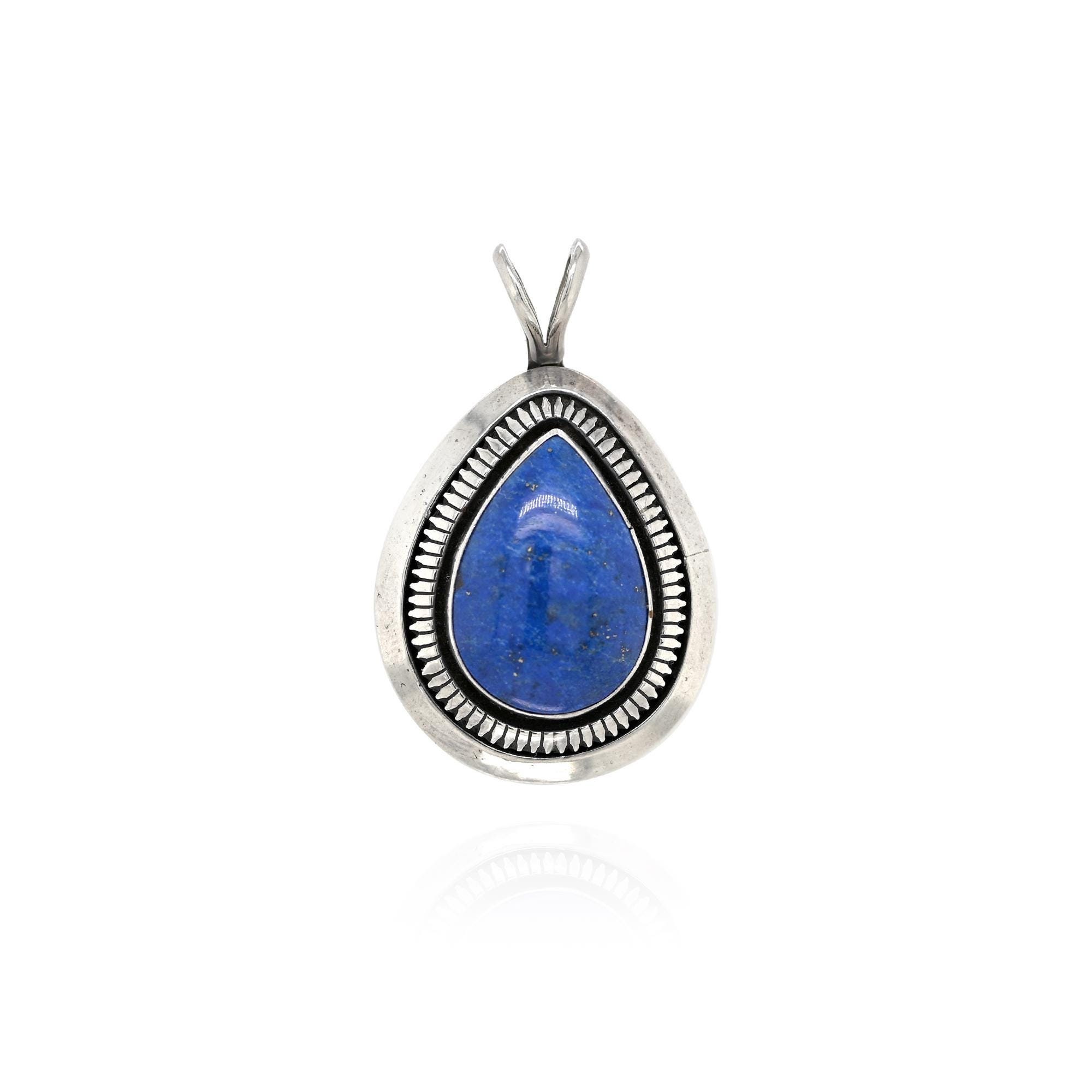 ナバホ族　Douglas Etsitt作　Sterling Silver Navajo Large Inlaid Bear J. Douglas Necklace sold at auction