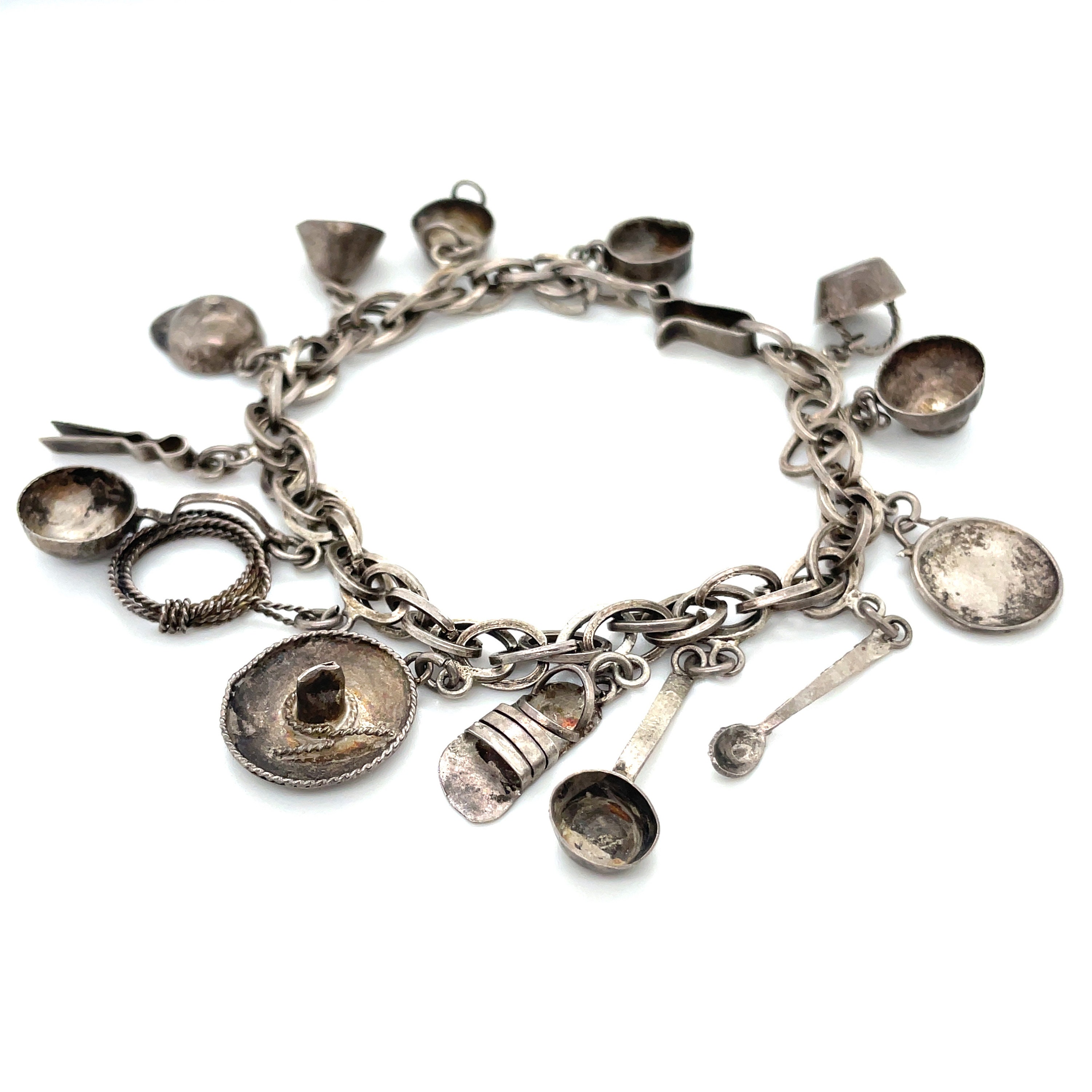14 Charm Loaded Silver Antique Mexican Charm Bracelet, Mexico