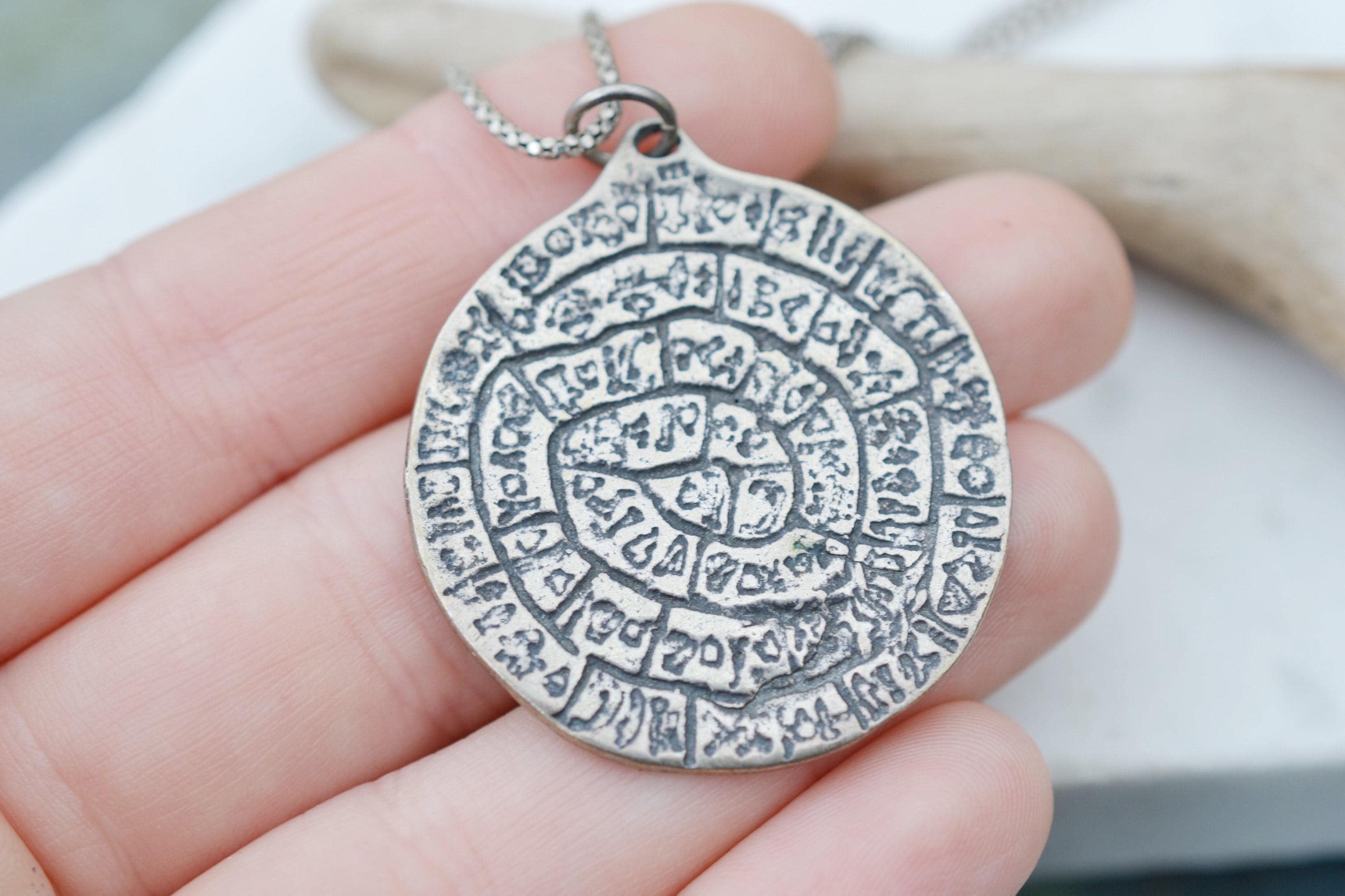 Phaistos store disk jewelry