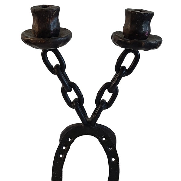 Cast iron horseshoe candleholder