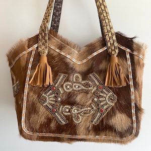 Boho bag in brown and white goatskin. Bohemian embroidered goatskin bag.vintage fringe tote bag. brown and gold bag.Tassel bag.