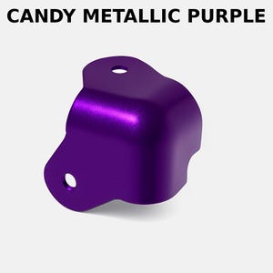 May include: A metallic purple corner brace with rounded edges and three holes. The brace is made of metal and has a shiny finish.
