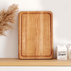 Luxuriöses Küchengeschenk: Personalisiertes Holzbrett
Handgefertigtes Eichenholz Schneidebrett in verschiedenen Größen