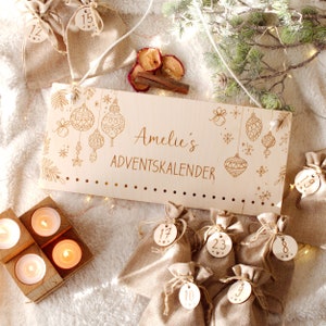 Adventskalender mit Namen und Säckchen