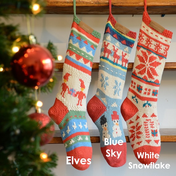 Hand knit blue and white Christmas Stocking with snowflake pattern