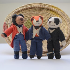 Hand Knitted Animal in Changeable Suit