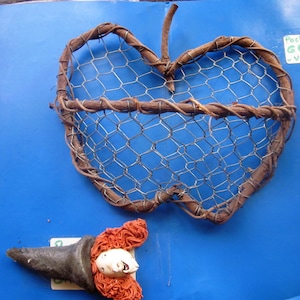 Vintage old woven wire basket wicker support for wall decoration that can contain any Halloween decoration object...