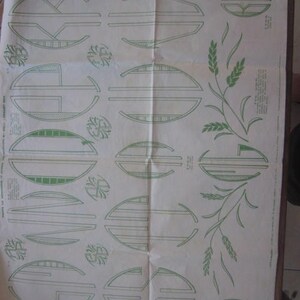 May include: A black and white diagram with green lines showing different shapes and patterns. The diagram is on a white background and includes the text "Instructions for Embroidery Designs".