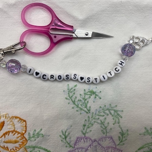 Lightweight scissor fob with bead accents, scissor & heart charms. Perfect for small scissors! Scissors not included.