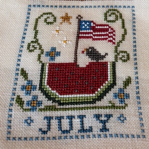 Juli Wassermelonen Flagge Kreuzstichmuster - Volkskunst im Garten