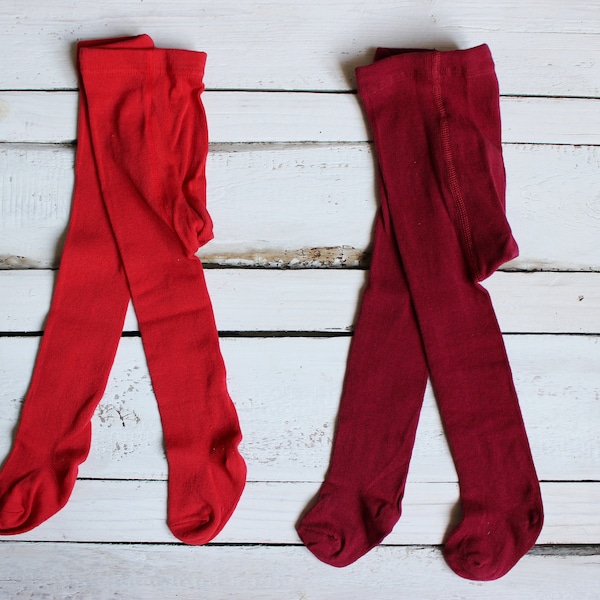 Collant rouge de chéri, collants bordeaux de noël de coton de bébé fille, collants rouges foncés de coton d’enfant en bas âge