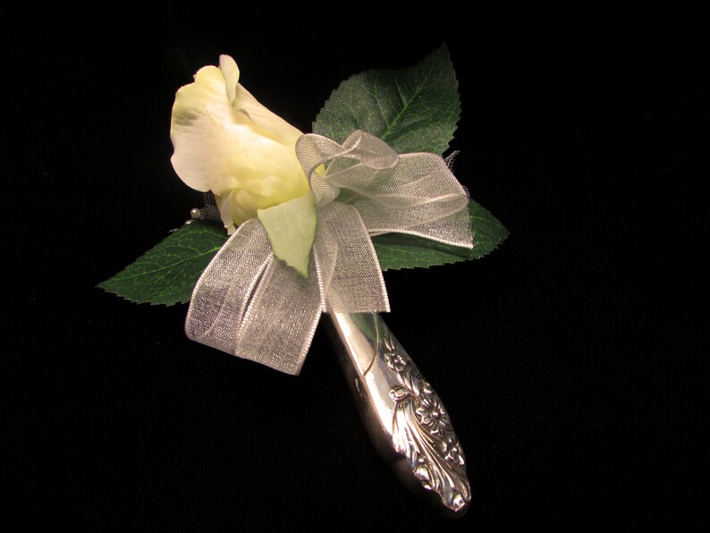 Lapel vase. Lapel pin created from a vintage 'Evening Etsy