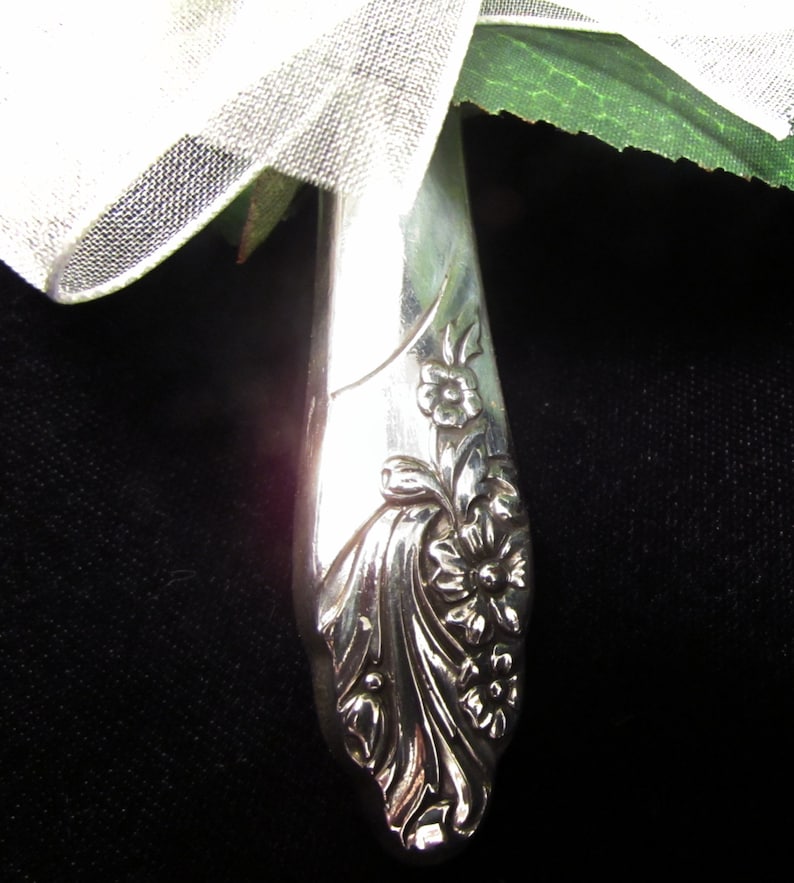 Lapel vase. Lapel pin created from a vintage 'Evening Etsy