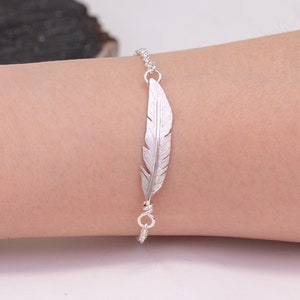 Bracelet with feather deals