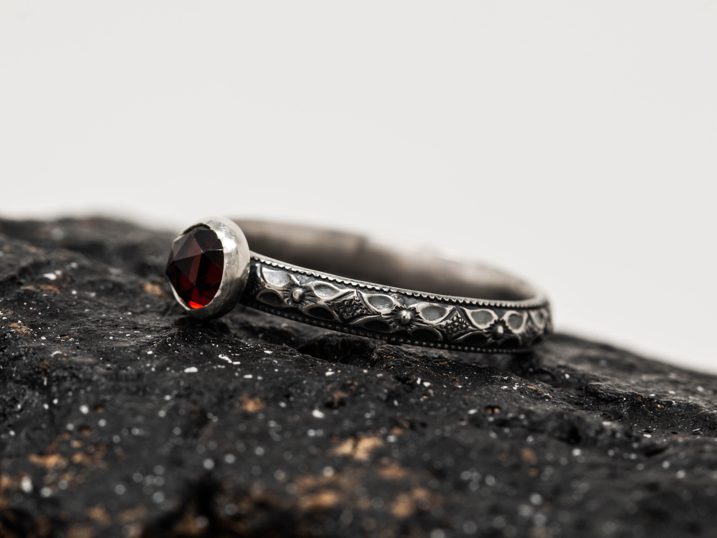 Sterling silver shop and garnet rings