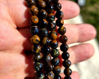 Bracciale elastico in oro blu con cristallo occhio di tigre: occhio di falco da 6 mm