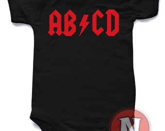 AB/CD baby suit.  Babygrow baby suit in sizes from 0-3 up to 12-18 months and 8 colours. For rock n roll babies only!